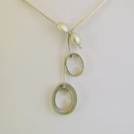 Oval Moving Neckpiece